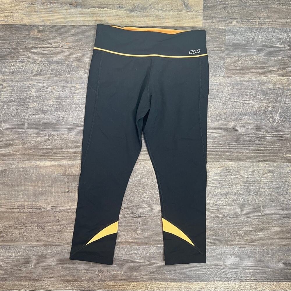 Lorna Jane black with yellow accents cropped legging pants size XS? b104
